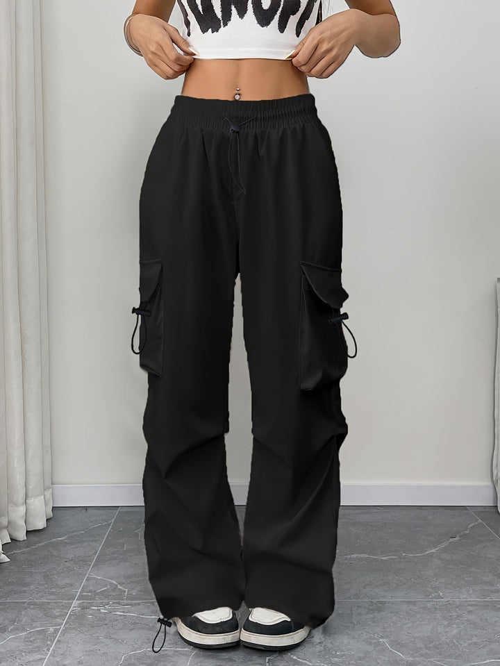Relaxed fit women's wide leg cargo pants featuring a comfortable drawstring waist and practical pockets.