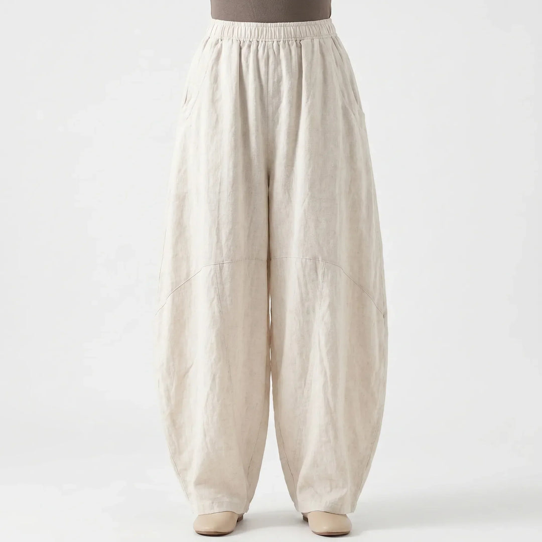 Loose fit wide-leg flowy comfort pants for women. Elastic waist trousers, perfect for relaxed casual summer fashion.