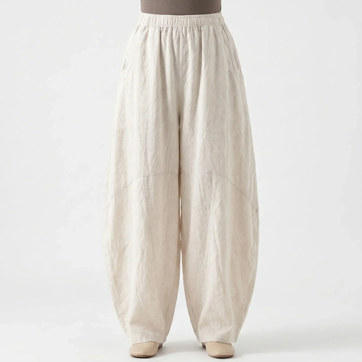 Loose fit wide-leg flowy comfort pants for women. Elastic waist trousers, perfect for relaxed casual summer fashion.