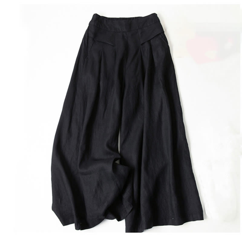 Women's wide-leg trousers, back view, flattering high waist, perfect for relaxed comfort.