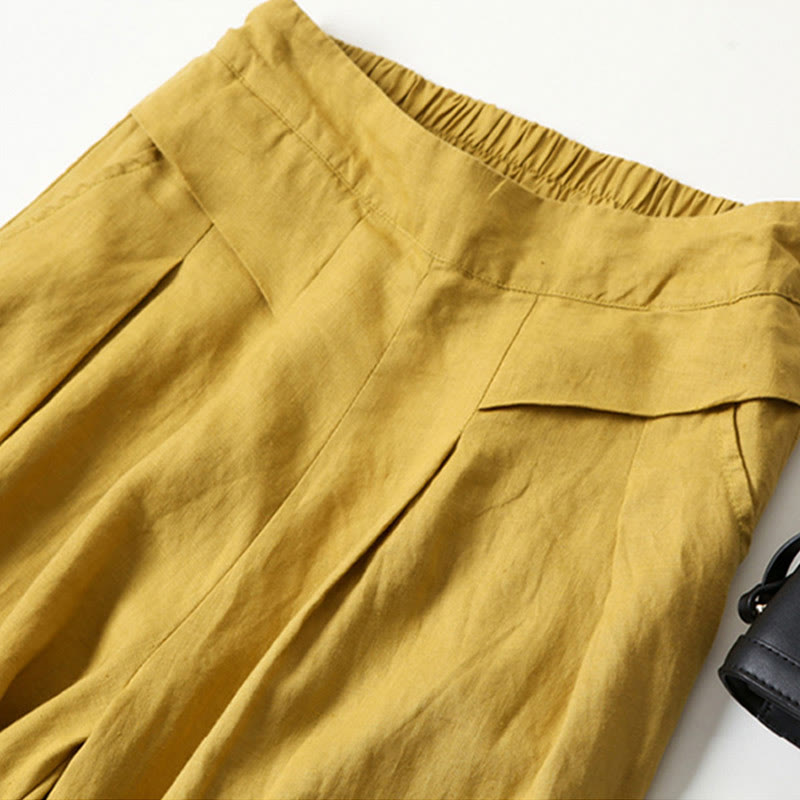Stylish wide-leg women's pants in navy, versatile for casual and fashion-forward looks.