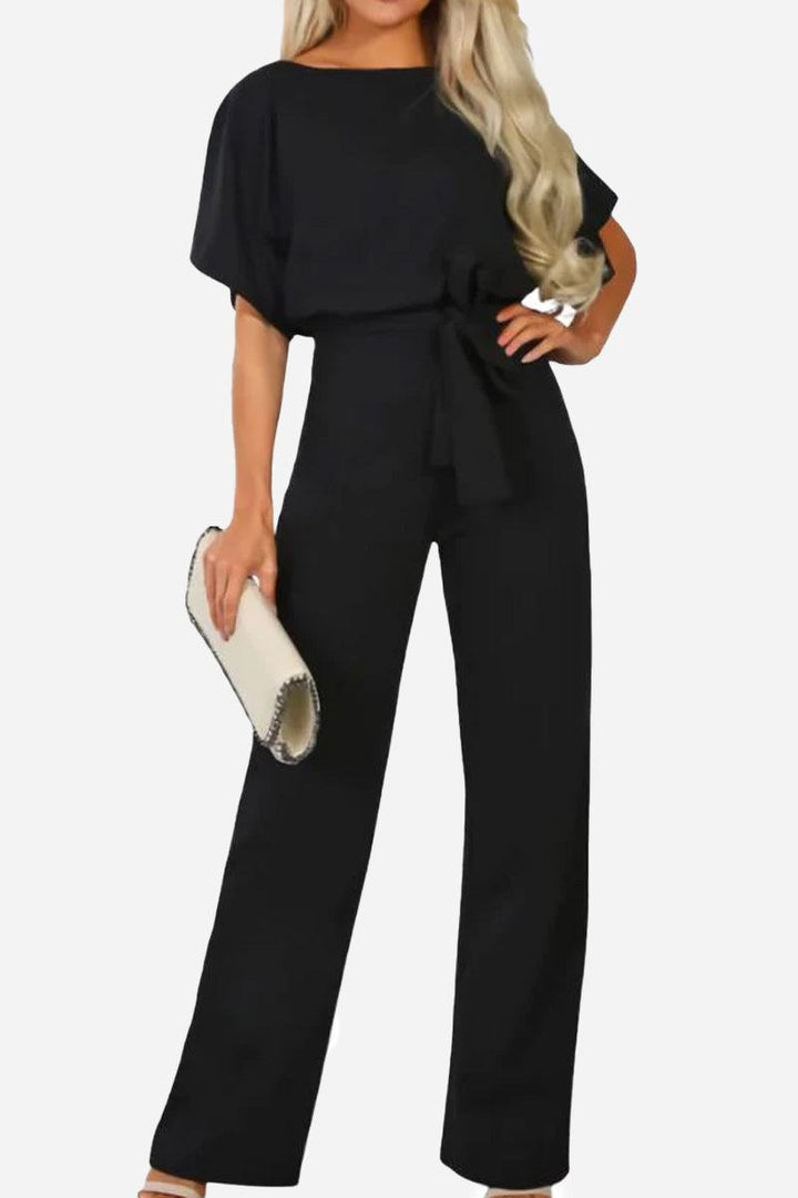 Women's wide-leg jumpsuit with elegant batwing sleeves & stylish adjustable belt. Perfect for versatile fashion.