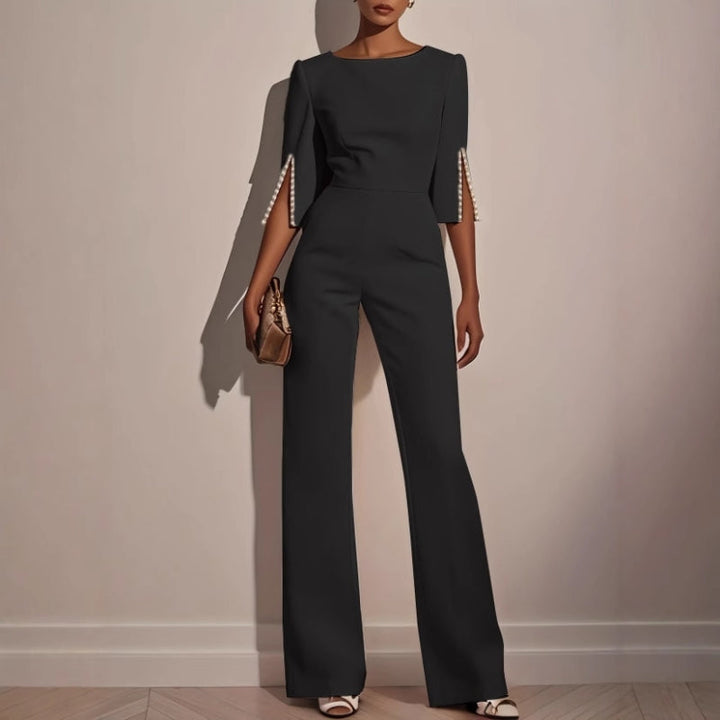 Chic and comfortable women's wide leg jumpsuit with unique pearl detail sleeves for relaxed fit fashion.