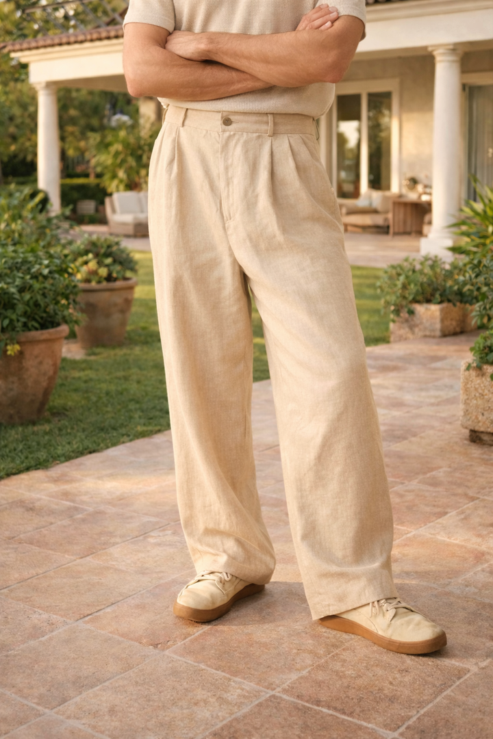 Comfortable women's wide leg trousers with pleated front. Chic, relaxed fit pants for office or casual wear.