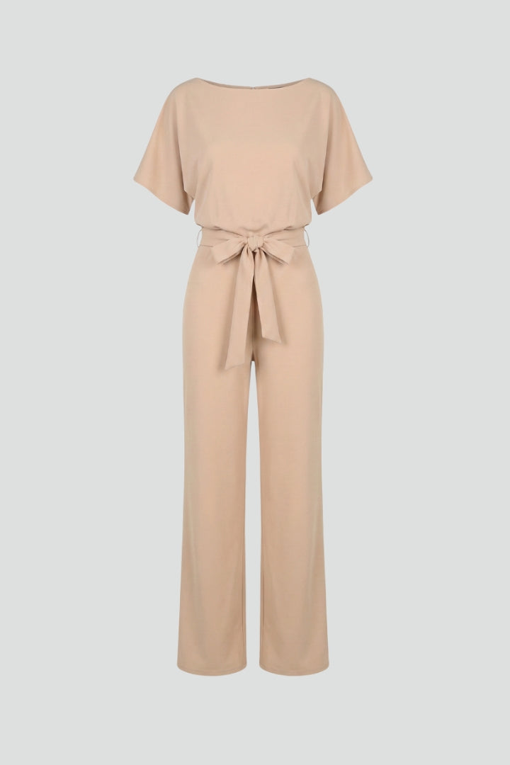 Women's wide leg short sleeve jumpsuit with belt. Elegant, comfortable one-piece for versatile summer style.