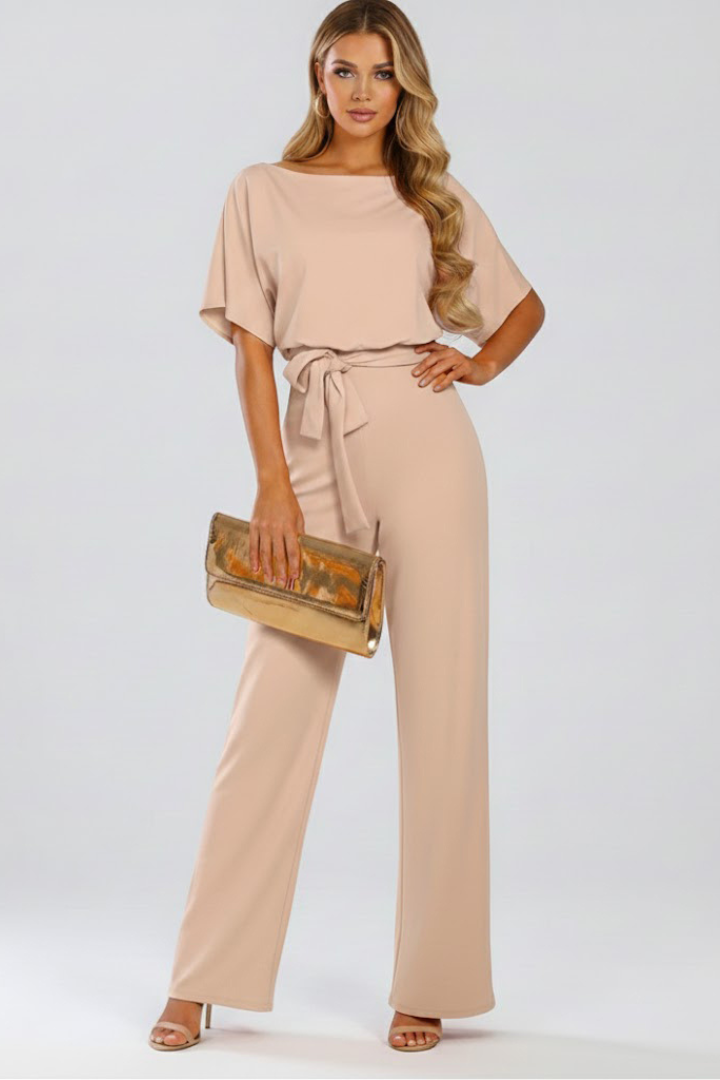 Casual chic women's wide leg jumpsuit. Short sleeves & belt make this a versatile day to night summer fashion.