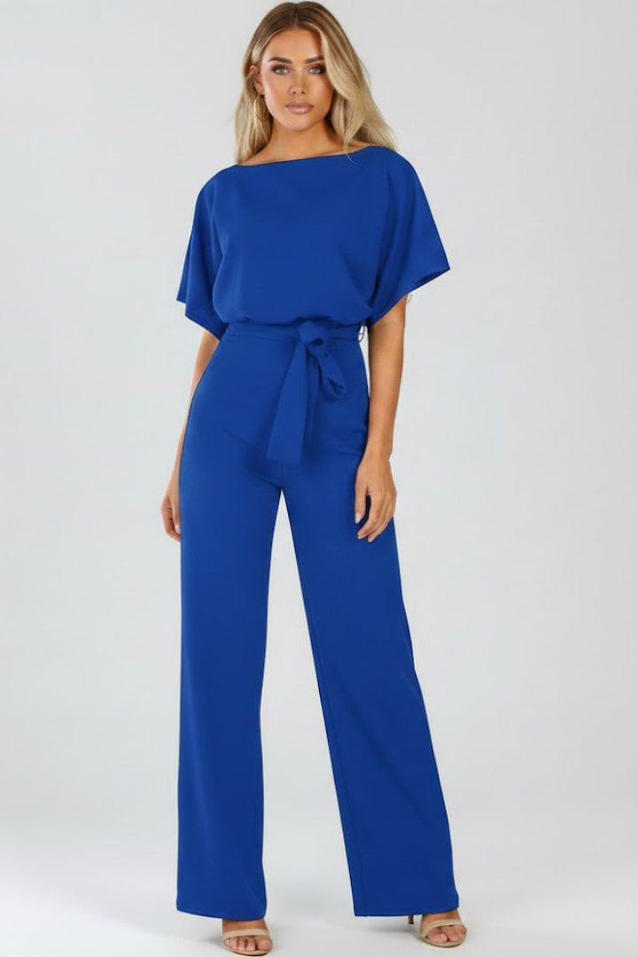 Comfortable women's wide leg short sleeve jumpsuit. Belted design offers a flattering fit for summer fashion.