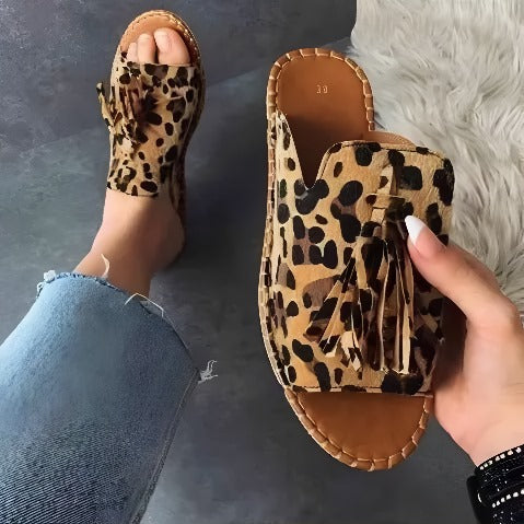 Stylish women's woven slides, perfect casual comfort footwear for summer, beach, or everyday wear.