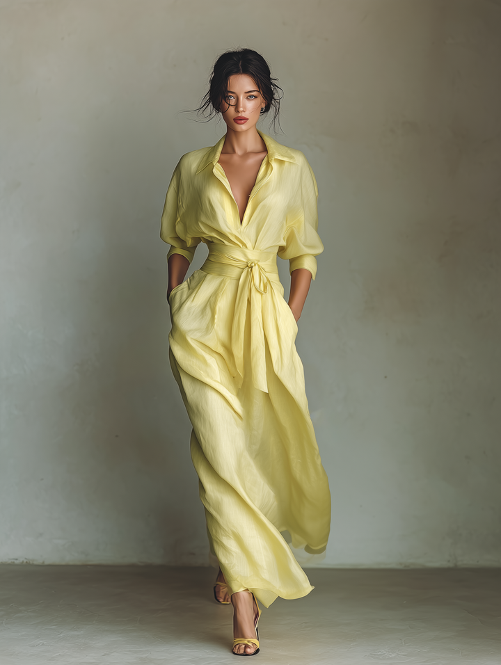 Chic yellow maxi shirt dress for women, ideal for summer resort wear. Features v-neck & tie waist.