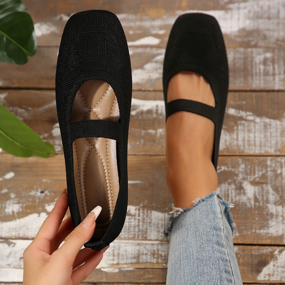 Women's yellow Mary Jane ballet flats with a cute smiling face design & adjustable strap, perfect for casual wear.