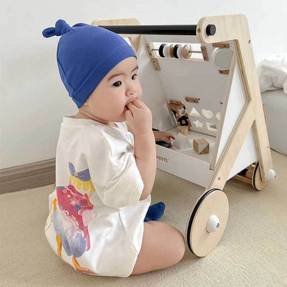 Wooden baby walker with bead maze and shape sorter, promoting early development