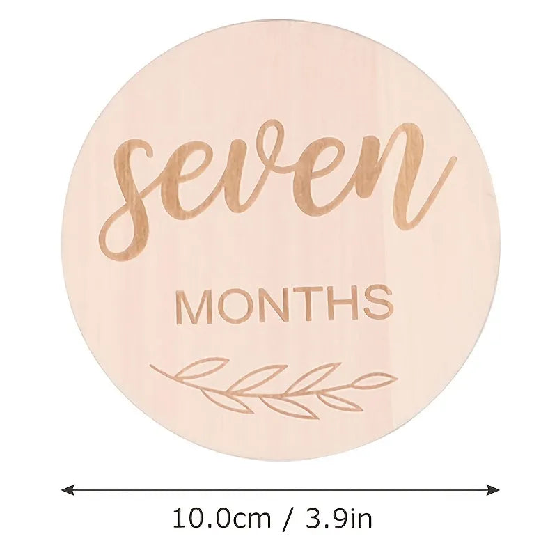 Unisex wooden milestone discs with 'One Week' side, perfect baby growth photo prop, first-year keepsake.