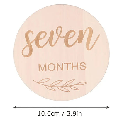 Unisex wooden milestone discs with 'One Week' side, perfect baby growth photo prop, first-year keepsake.