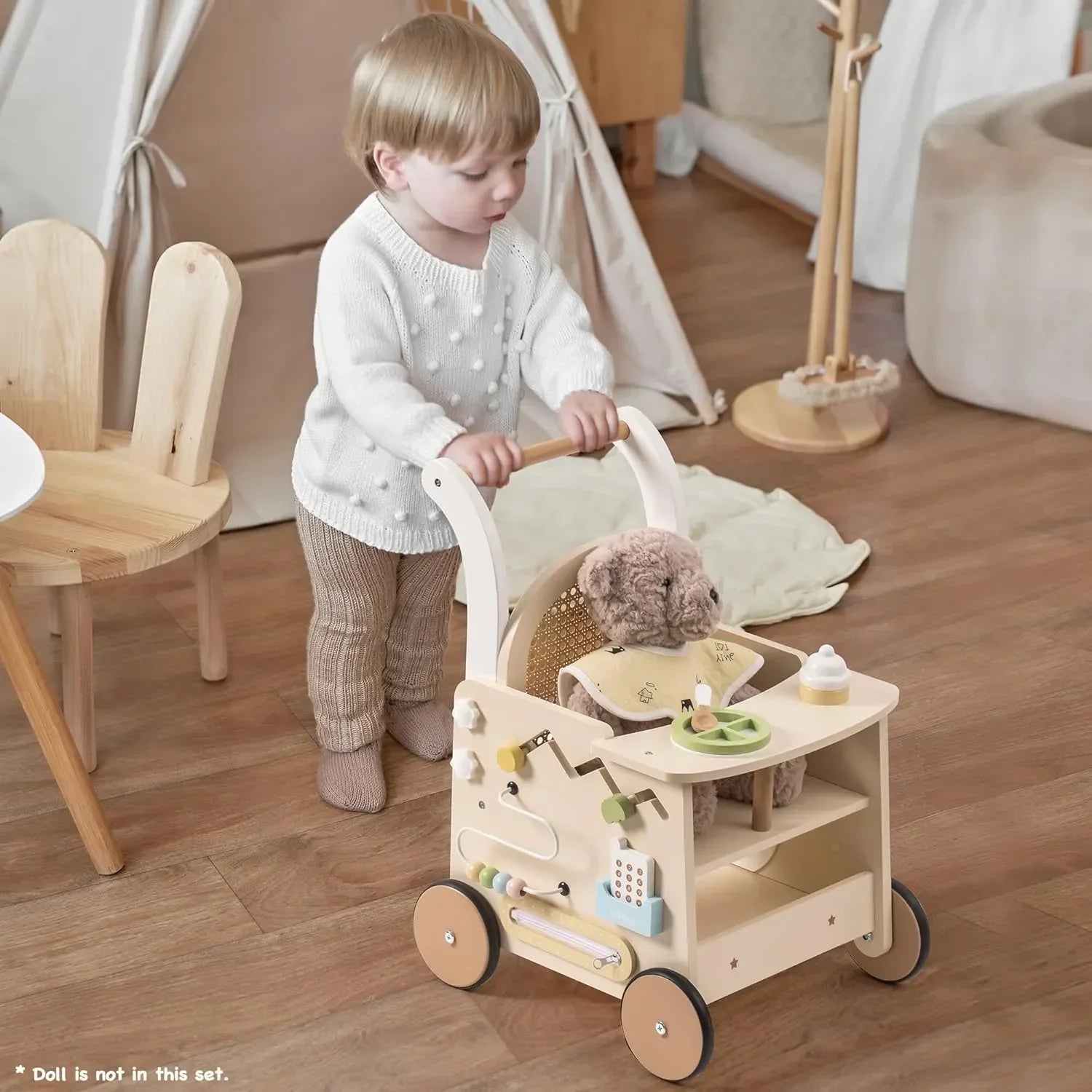 Toddler pushing wooden activity walker with colorful beads & blocks, promoting early learning