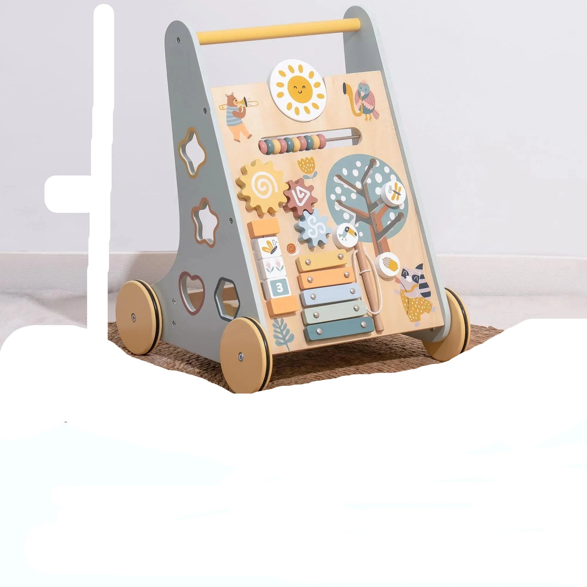 Close-up of wooden baby walker's activity center, showing shape sorter and spinning gears for toddlers.