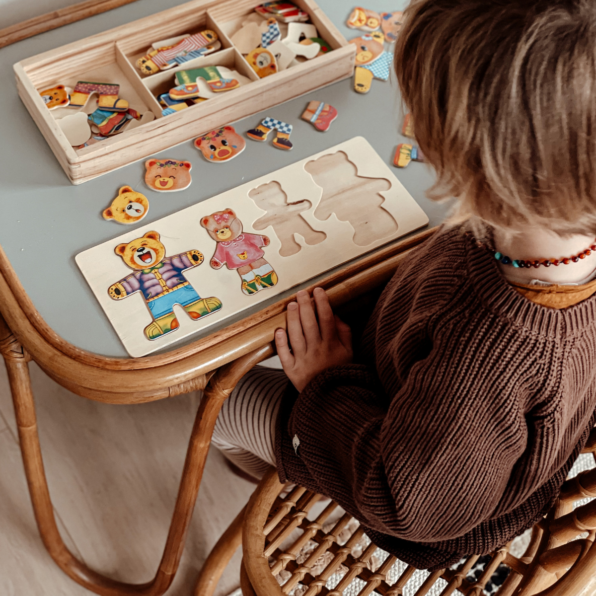 Educational bear puzzle toy for preschoolers, developing fine motor skills.