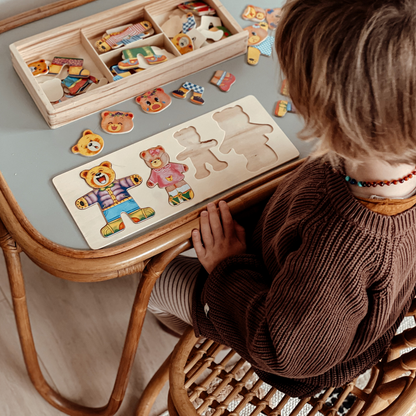 Educational bear puzzle toy for preschoolers, developing fine motor skills.