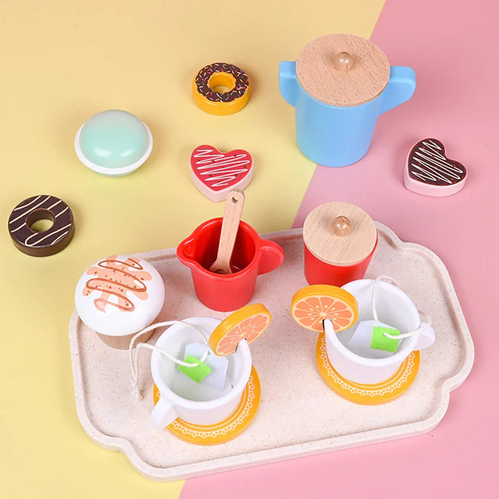 Brightly painted wooden birthday cake & tea set. Engaging kids in pretend play & fine motor activities.