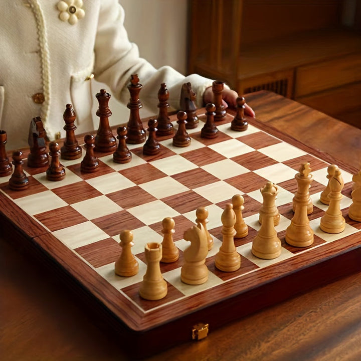 Elegant wooden foldable chess set with finely crafted pieces. Perfect portable strategy game.