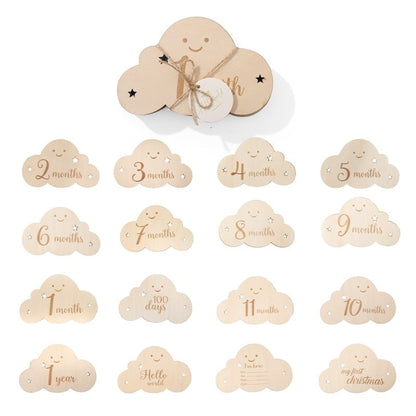 Set of wooden baby monthly milestone cards with cloud shape, ideal first year growth photo prop.