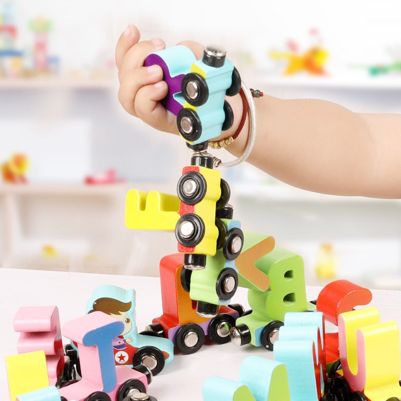 Kids playing with a brightly colored wooden magnetic alphabet and number train set