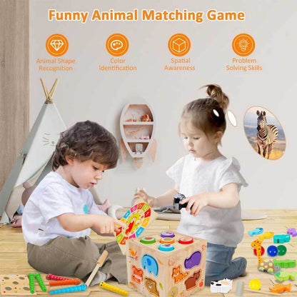 Close-up of a wooden Montessori activity cube featuring a bead maze and shape sorter