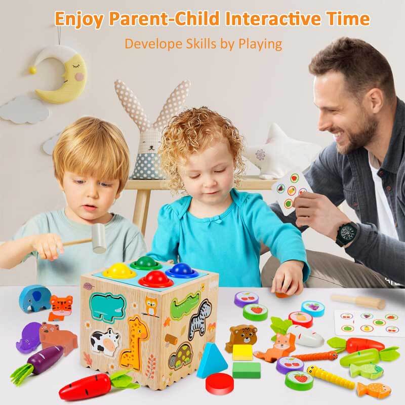 Baby interacting with a wooden activity cube, a montessori learning toy for toddlers