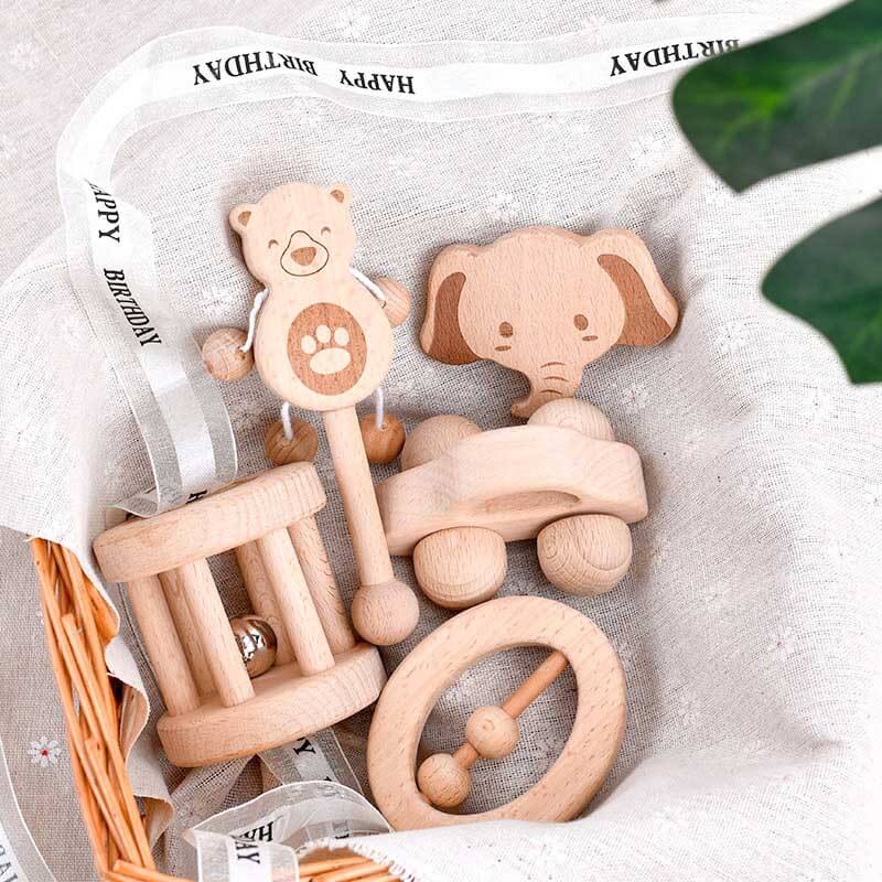 Wooden musical hand bell set for sensory play, perfect baby toy and newborn gift.