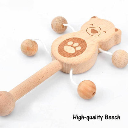 Assorted wooden musical hand bells, a charming and educational baby toy made from beech wood.