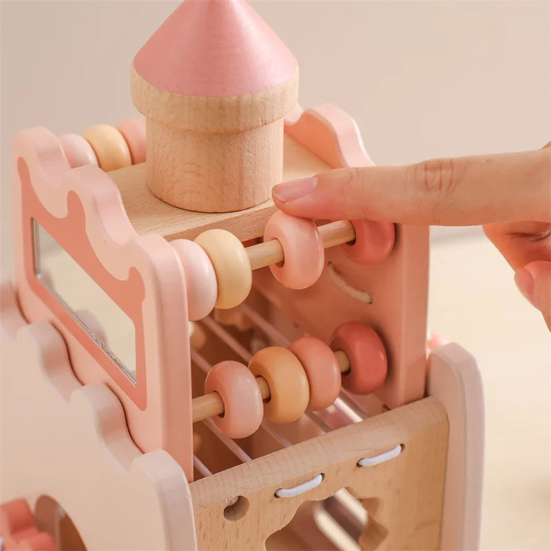 Wooden Musical Instrument Tower featuring chimes & gears, designed for creative play and motor skills