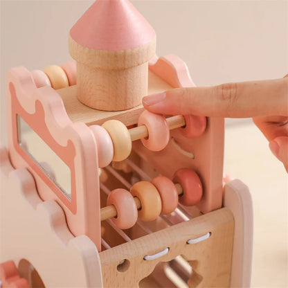 Wooden Musical Instrument Tower featuring chimes & gears, designed for creative play and motor skills