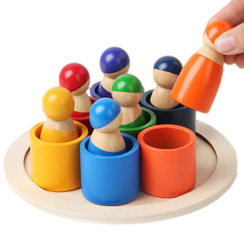 Wooden rainbow stacking puzzle, Montessori toy for toddlers, promotes fine motor skills & color recognition.