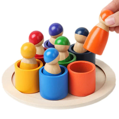 Wooden rainbow stacking puzzle, Montessori toy for toddlers, promotes fine motor skills & color recognition.