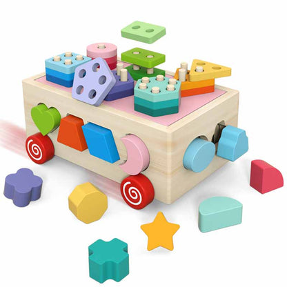 Close-up of wooden shape sorting car, bright geometric blocks fit into corresponding holes on educational toy