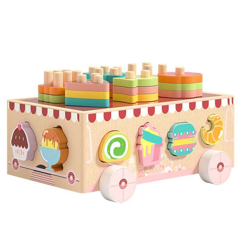 Front view of a wooden educational shape sorter toy car on a white background.