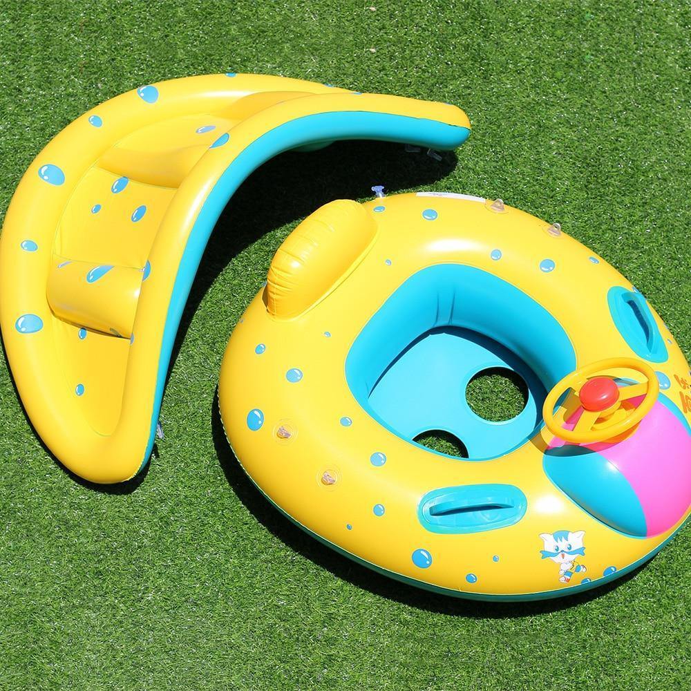 Infant safety float with integrated sunshade and steering wheel, perfect for baby's first swim