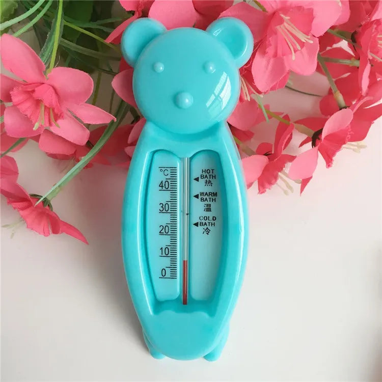 Yellow floating bear bath thermometer for safe baby bathtime, checks water temperature.
