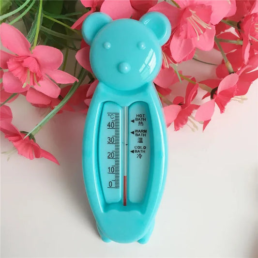 Yellow floating bear bath thermometer for safe baby bathtime, checks water temperature.