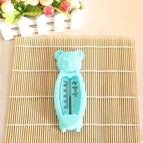 Two floating bear bath thermometers, yellow and blue, for child safety during bath time fun.