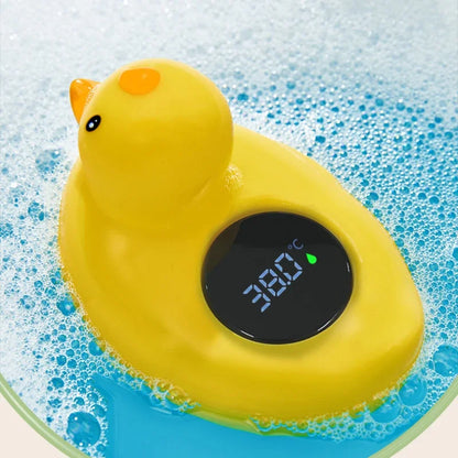 Yellow rubber duck baby bath thermometer floating in water, digital display, waterproof safety sensor