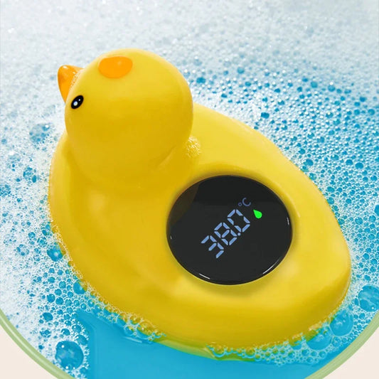 Yellow rubber duck baby bath thermometer floating in water, digital display, waterproof safety sensor