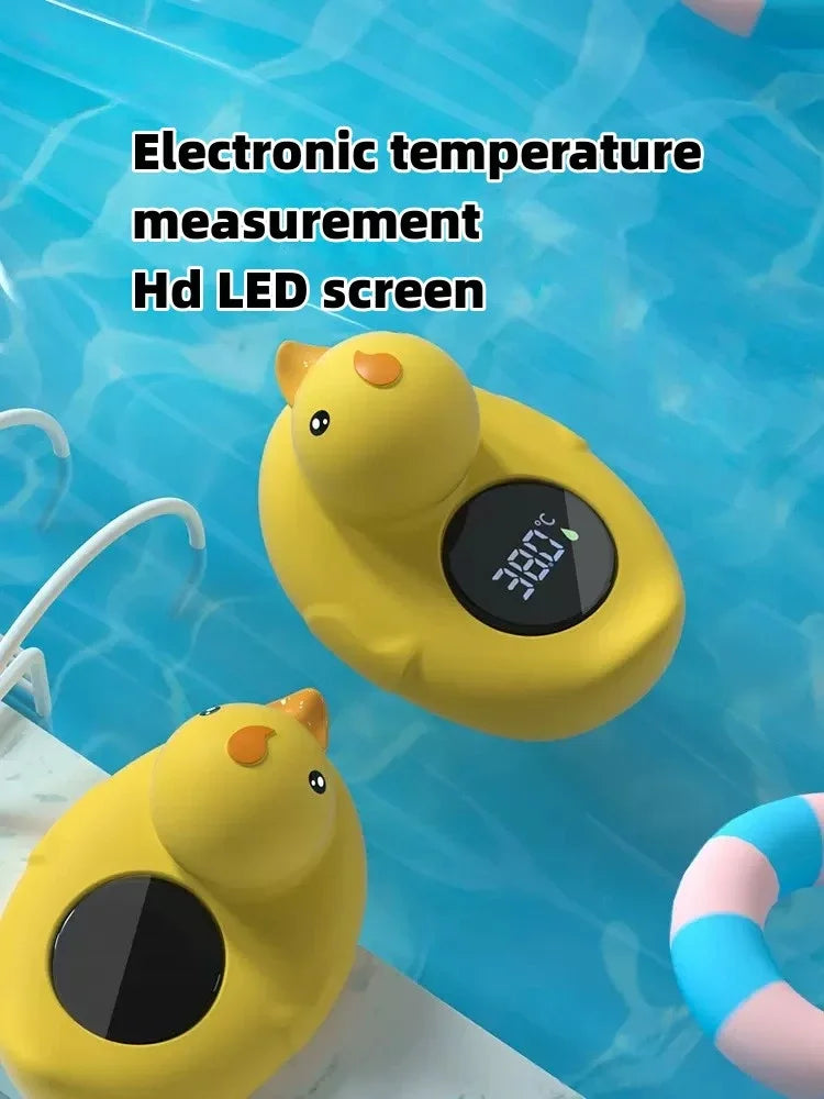 Close-up of a cute yellow duck floating bath thermometer, clear digital temperature reading, baby safety