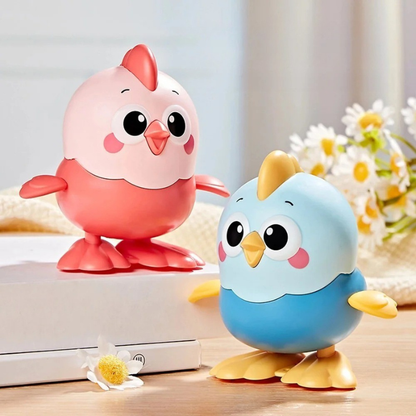 Yellow wind-up crawling chick toy for kids, perfect for encouraging active play & motor skills.