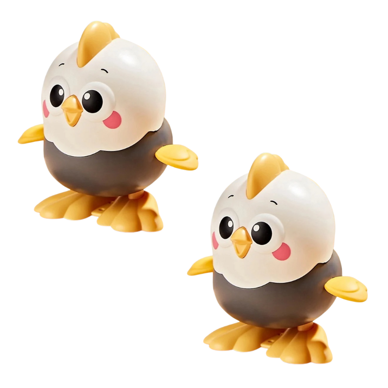 Kids' wind-up chick toy in motion, fostering crawling & interactive play for young children.