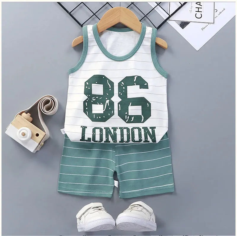 Blue toddler sports set details: soft cotton blend fabric, contrast stitching, and comfortable fit.