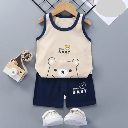 Full shot of a happy child wearing the blue summer sports set, ready for outdoor fun.