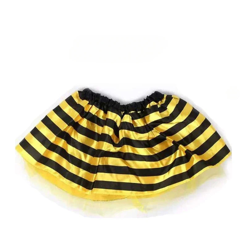 Imaginative play: girl twirling in a beautiful bee princess costume, highlighting the tutu skirt and elegant sheer wings.