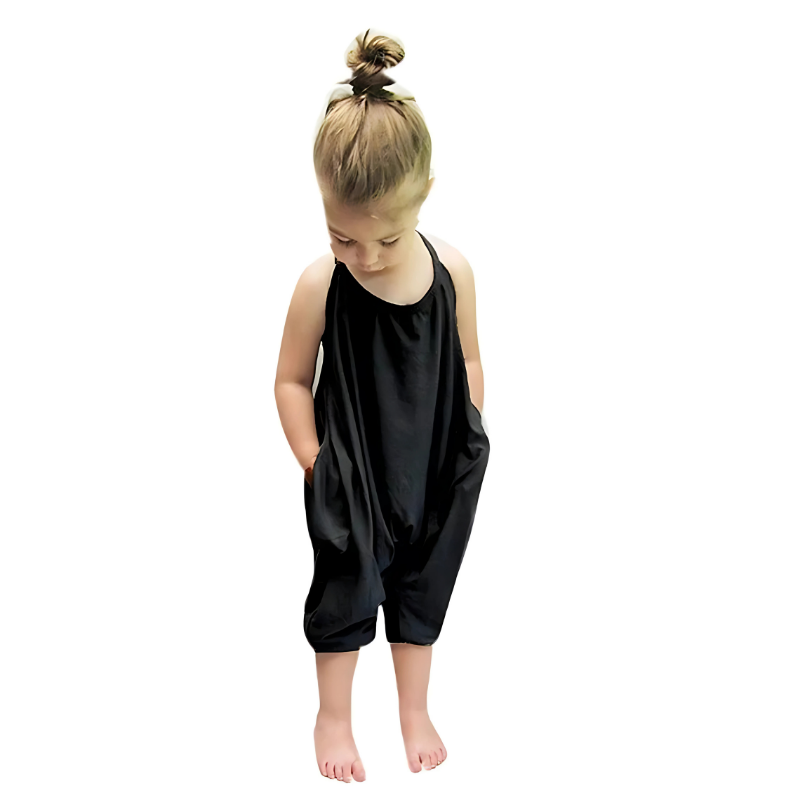 Back view of a girl wearing a comfortable backless harem jumpsuit, ready for summer fun